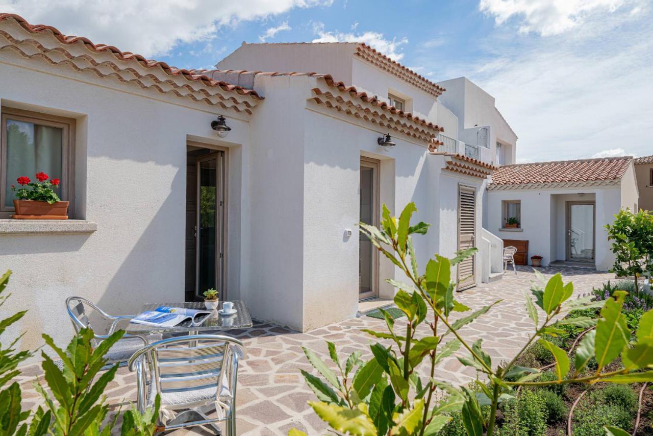 Отель Residenza L'Alzoni Сан-Теодоро Экстерьер фото